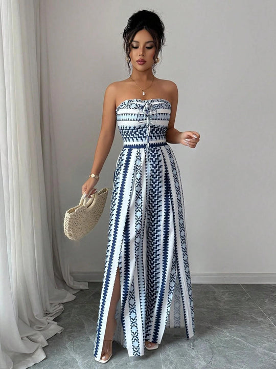 👗 50% OFF NOW! 💥 Geometric Jumpsuit with Halter Neckline & Side Slit – Unique print & elastic back – Versatile, perfect for summer parties or resort wear ✨
