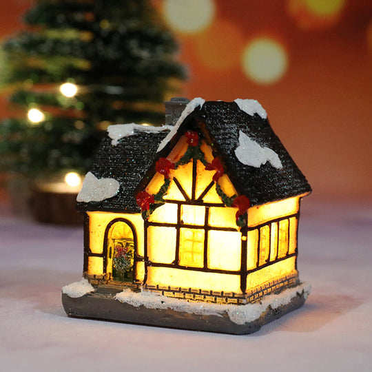 Miniatyr LED-upplyst julbyhus